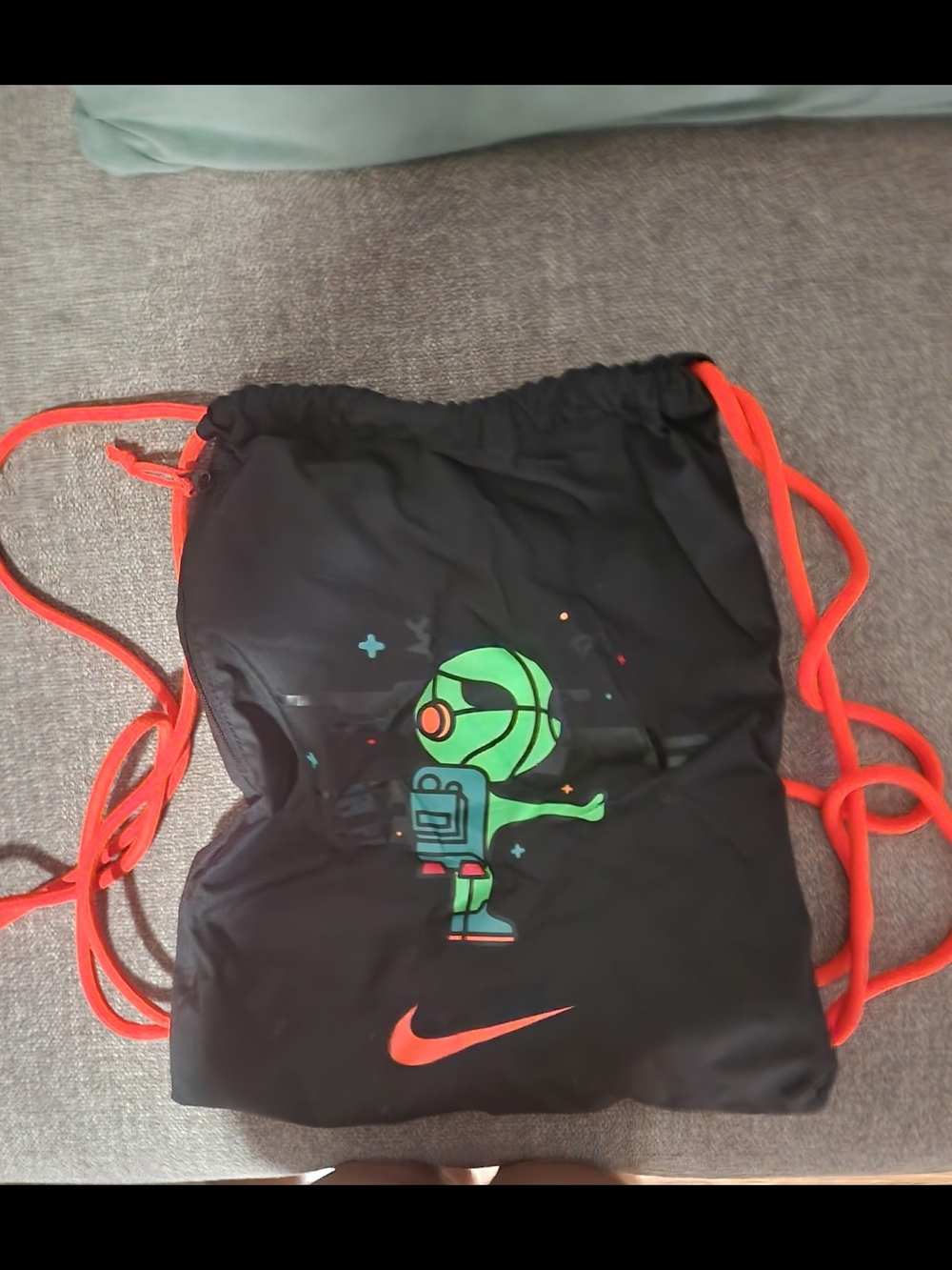 Nike Black Drawstring Backpack with Neon Orange Straps & Green Alien